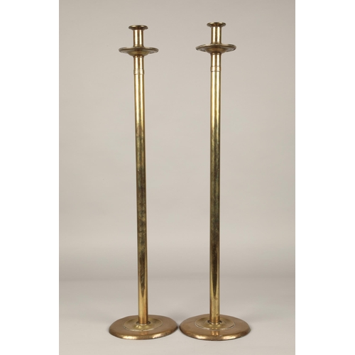 191 - Large pair of brass candlesticks made and designed by C Percy Bowyer, 75cm high