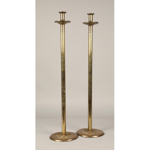 191 - Large pair of brass candlesticks made and designed by C Percy Bowyer, 75cm high