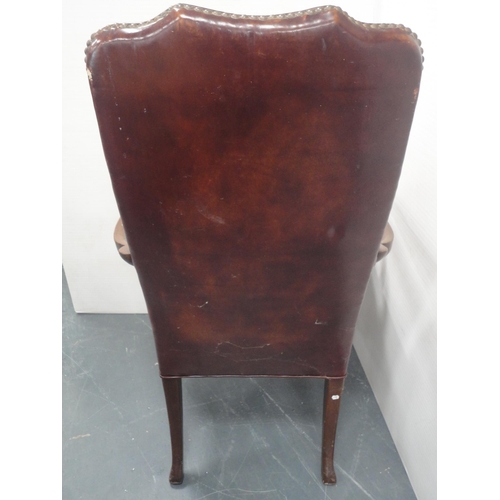 140 - 'The Hickory Chair' in the form of a library chair, upholstered in studded reddish brown leather, do... 