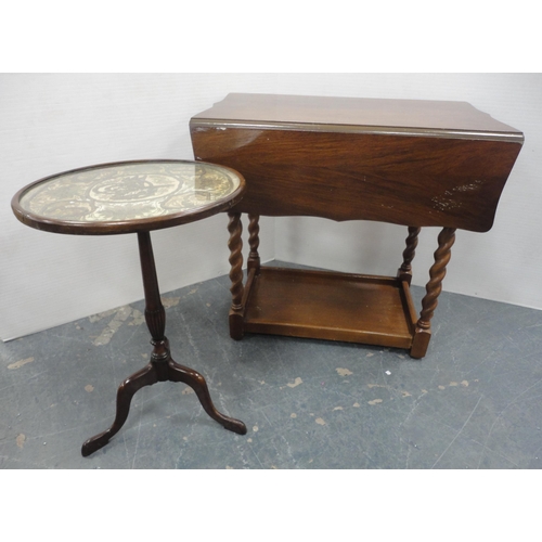 141 - Mahogany wine table with needlepoint decoration to the top, 61cm high, and a walnut drop-leaf table.... 