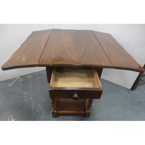 141 - Mahogany wine table with needlepoint decoration to the top, 61cm high, and a walnut drop-leaf table.... 