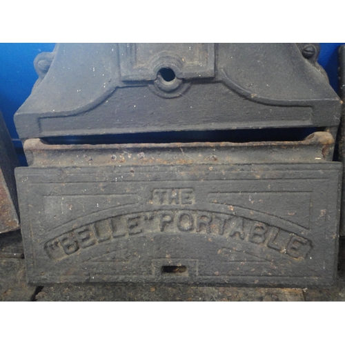 151 - 'The Belle Portable' cast iron range, with lift-off compartments to the top section, with flue, abov... 