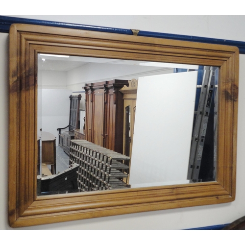 154 - Pine-framed wall mirror, 68cm x 93cm.