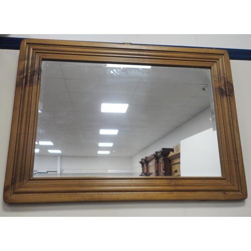 154 - Pine-framed wall mirror, 68cm x 93cm.