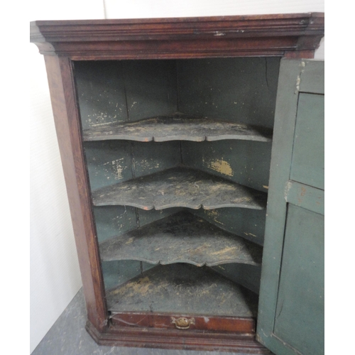 156 - Late 18th century oak corner cupboard with panelled door enclosing shelving, 108cm high, 82cm wide a... 