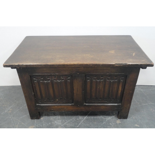 158 - Antique-style small oak coffer with hinged top and incised decoration to the front, on stile support... 