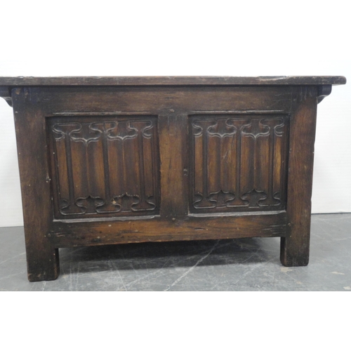 158 - Antique-style small oak coffer with hinged top and incised decoration to the front, on stile support... 