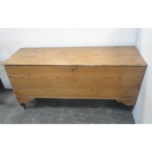 160 - Victorian pine coffer with a hinged top enclosing a candle box, on shaped feet, 67cm high, 132cm wid... 