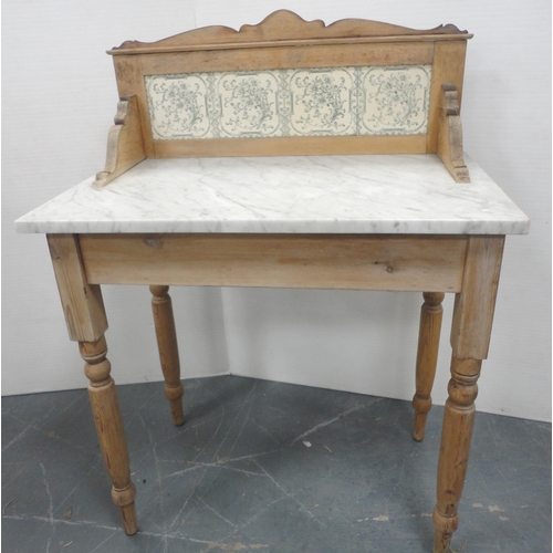 167 - Pine wash stand with marble top and tiled splash-back, 103cm high, 77cm wide and 46cm deep.