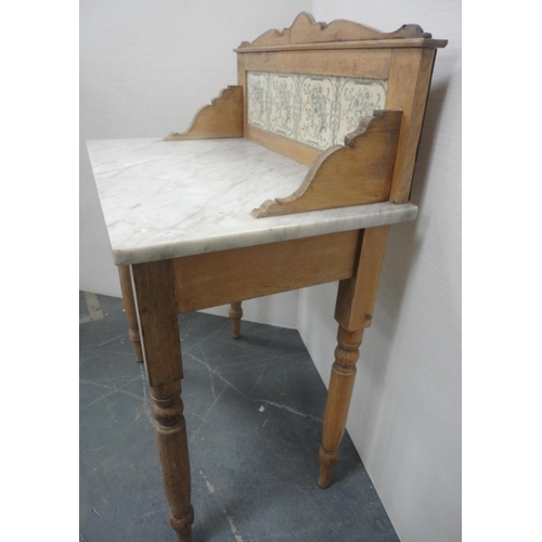 167 - Pine wash stand with marble top and tiled splash-back, 103cm high, 77cm wide and 46cm deep.