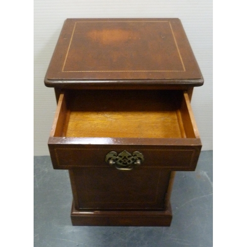 176 - Early 20th century walnut inlaid bedside locker with a short drawer above a cupboard door enclosing ... 