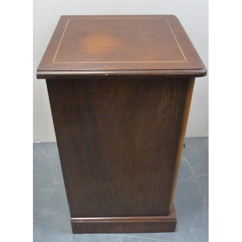 176 - Early 20th century walnut inlaid bedside locker with a short drawer above a cupboard door enclosing ... 