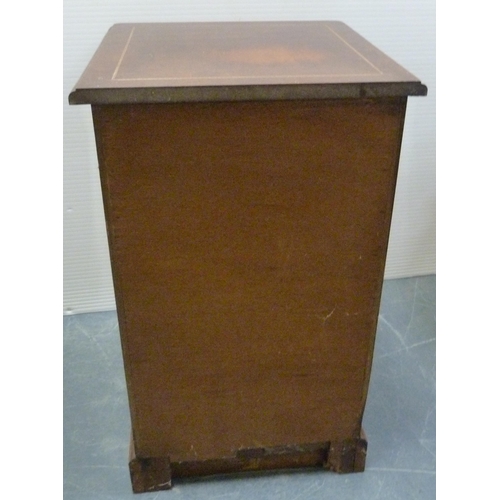 176 - Early 20th century walnut inlaid bedside locker with a short drawer above a cupboard door enclosing ... 