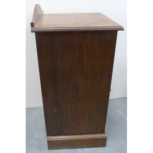 177 - Victorian walnut bedside locker with panelled door, on plinth base, 78cm high, 39.5cm wide and 37cm ... 