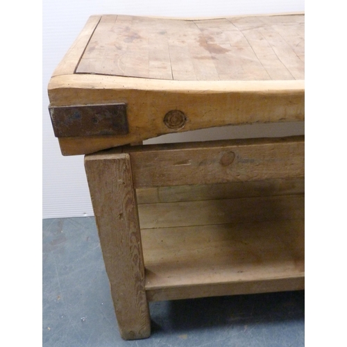 180 - French-style pine butcher's block with shaped, curved top, metal brackets, on a pine stand, c. 1920,... 