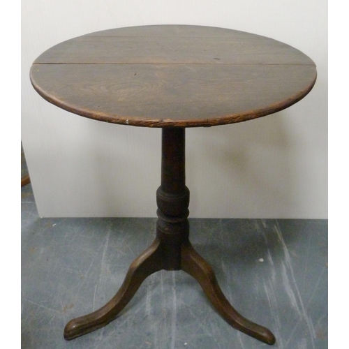 182 - George III oak circular table, with saucer top on turned column and tripod base, 71cm high and 59cm ... 