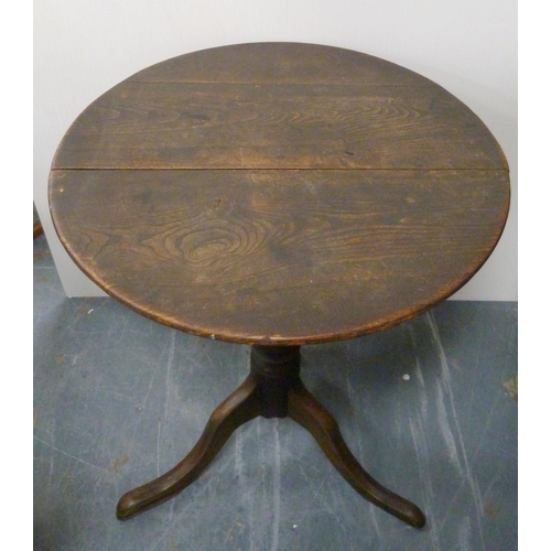 182 - George III oak circular table, with saucer top on turned column and tripod base, 71cm high and 59cm ... 