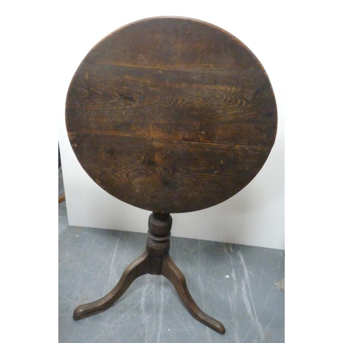 182 - George III oak circular table, with saucer top on turned column and tripod base, 71cm high and 59cm ... 