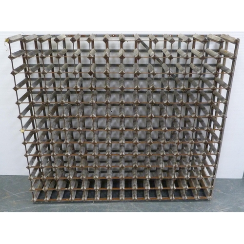 190 - Pine and galvanised bottle rack with 168 apertures, 120cm high, 140cm wide and 26cm deep.