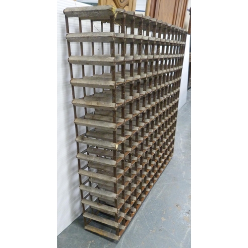 190 - Pine and galvanised bottle rack with 168 apertures, 120cm high, 140cm wide and 26cm deep.