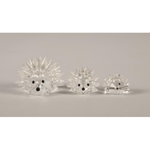 18 - Two Swarovski Crystal butterflies and three Hedgehogs. (5)