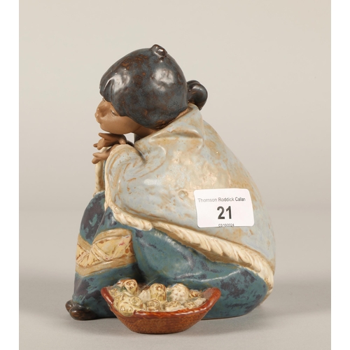 21 - Lladro Inuit figure of a seated girl with a basket 16cm