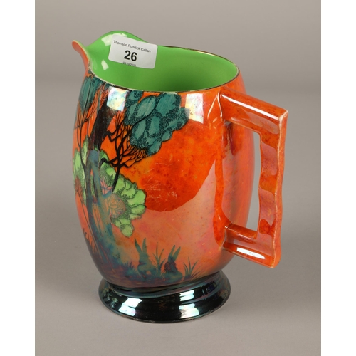 26 - Carlton Ware lustre jug decorated in oranges featuring trees and rabbits. 20cm hig