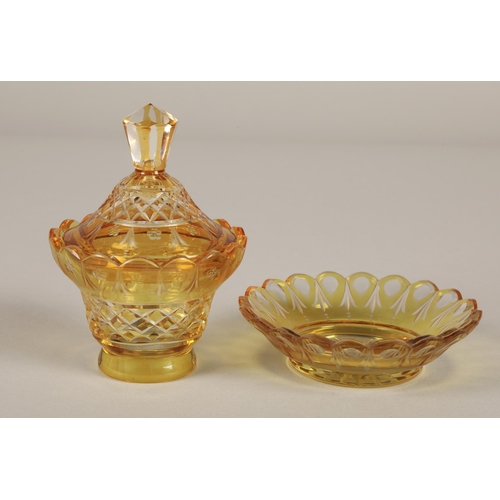 33 - Bohemian amber glass preserve jar, cover and saucer, 22cm high.