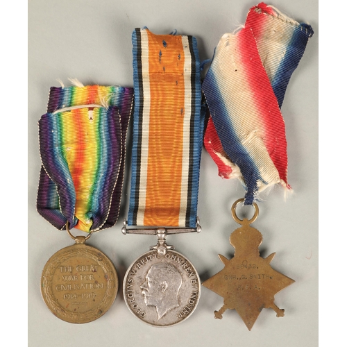 55 - Three British WWI medals awarded to 98432 GNR. C. SMITH. R. A. to include 1914-1915 star