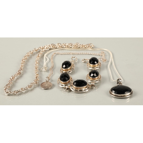 71 - Silver jewellery to include black gem set necklace and bracelet, chain, and white metal St Christoph... 