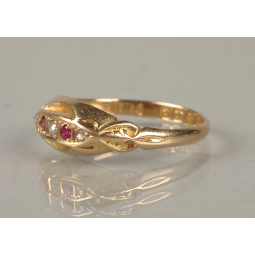 74 - 18ct gold ring set with a trio of diamonds interspersed with ruby coloured gemstones, ring size P, 2... 