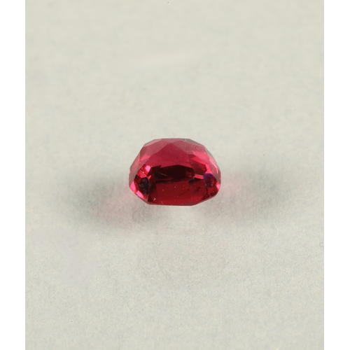 85 - Two loose gemstones, a cabochon 9mm across likely fire opal, and a faceted pink gem 4.5mm across lik... 