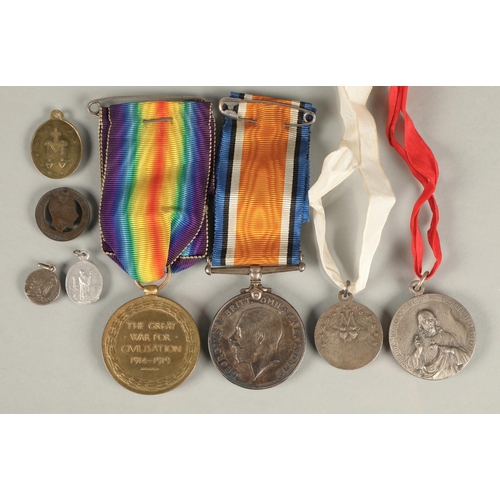 87 - Two British WWI medals awarded to 176077 GNR. A. JENNINGS. R. A., 1911 farthing cut-out pendant, and... 