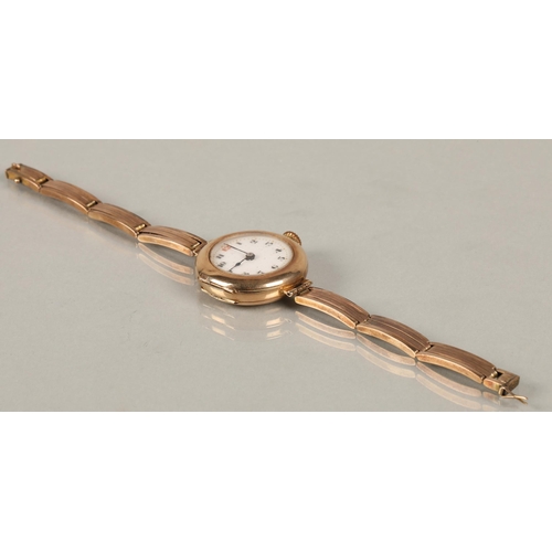 118 - 9ct gold wristwatch and 9ct gold expandable strap, (clasp damaged), 22 g