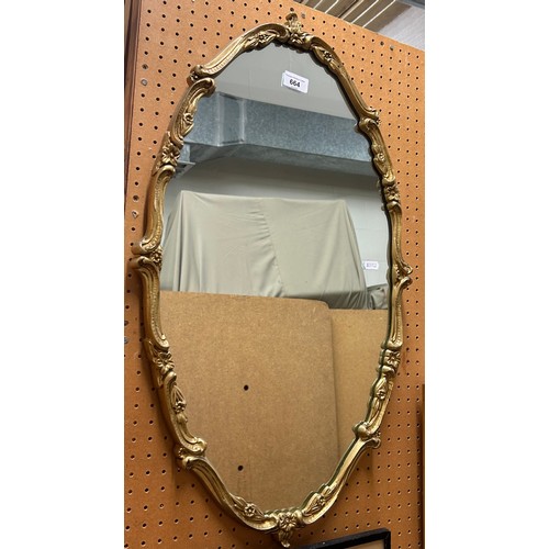 664 - Ornate wall mirror.