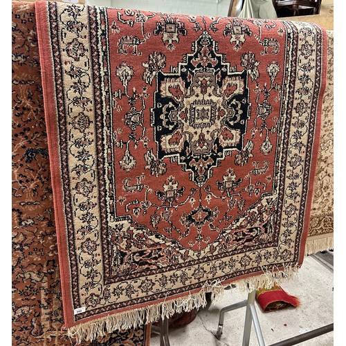 668 - Eastern style floor rug approx 150cm x 100cm.