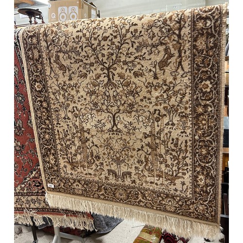 669 - Brown and white eastern style floor rug approx 180cm x 90cm