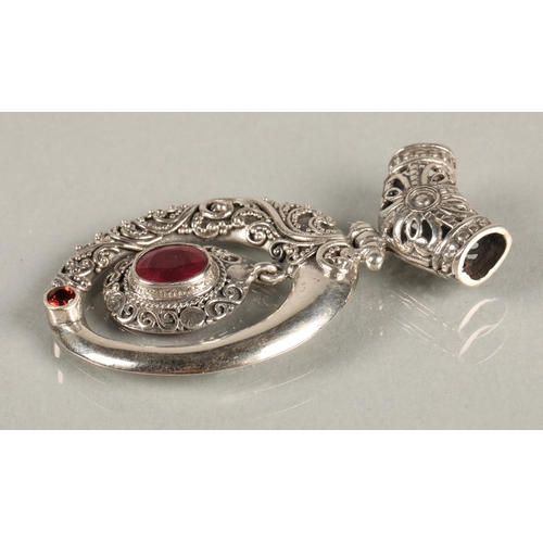 96 - Three silver pendants set with pink and red gemstones, possibly including spinel/ruby/calcite