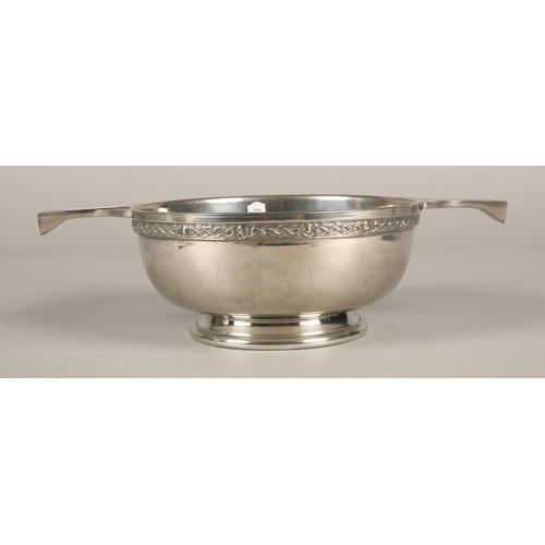 222 - Large Culfonia pewter quaich, a silver napkin ring (37g), and a white metal spoon with mother of pea... 