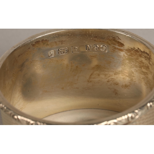 222 - Large Culfonia pewter quaich, a silver napkin ring (37g), and a white metal spoon with mother of pea... 