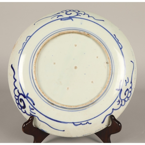 229 - Famille rose saucer dish, a Japanese blue and white plate, and two bottle vases and another. (5)