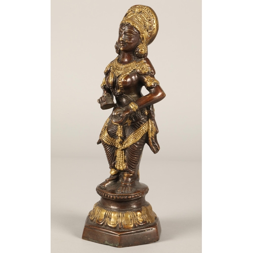 259 - Bronzed figure of a Tibetan goddess. 30cm