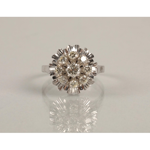 69 - Ladies 18ct white gold diamond cluster ring, central stone 0.4 carat, surrounded by eight 0.15 carat... 