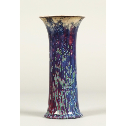 1 - Ruskin Pottery high fired lily vase, the glaze in mottled tones of grey, red and lavender, with impr... 