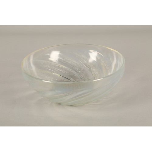 42 - Rene Lalique opalescent bowl in the Poissons design, marked R Lalique to the centre 24cm diameter, 9... 