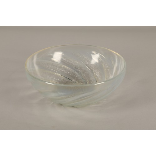 42 - Rene Lalique opalescent bowl in the Poissons design, marked R Lalique to the centre 24cm diameter, 9... 