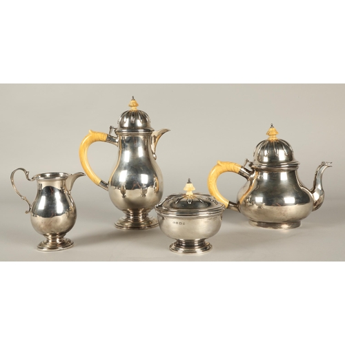 159 - Four piece silver tea service comprising of teapot coffee pot, sugar basin and cream jug with ivory ... 