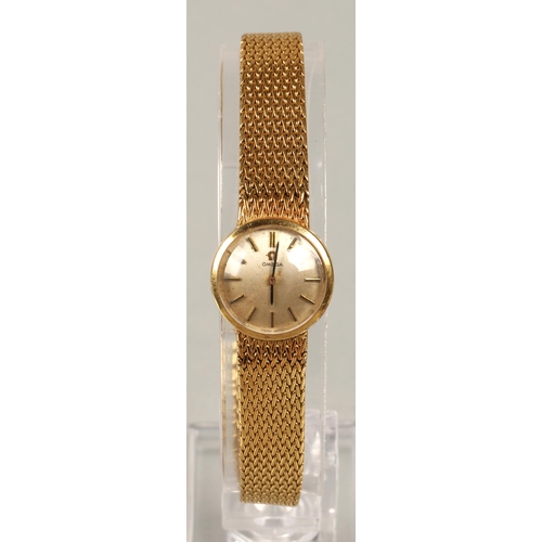 116 - Ladies Omega 18ct gold wristwatch, champagne dial with baton hour markers, dial 1.5cm diameter, 31g,... 