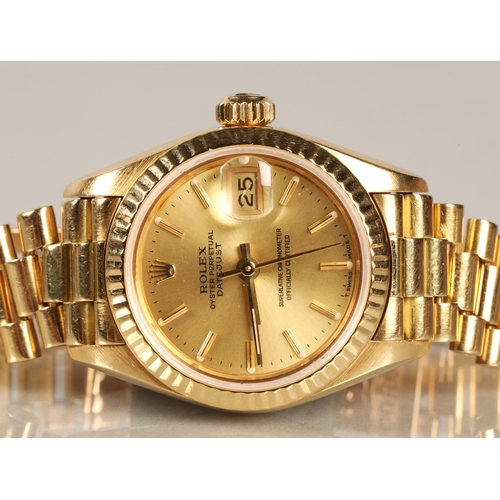 108 - Rolex 18K yellow gold Oyster Perpetual Date Just Ladies wrist watch, champagne dial with hour marker... 