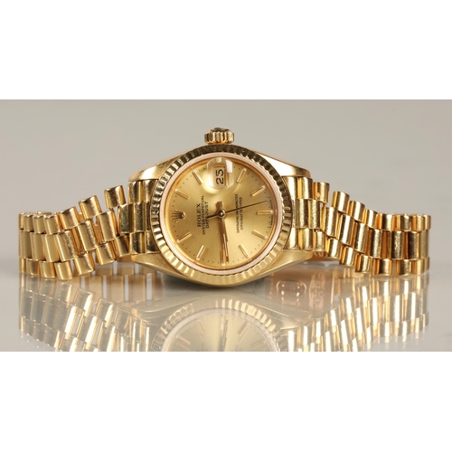 108 - Rolex 18K yellow gold Oyster Perpetual Date Just Ladies wrist watch, champagne dial with hour marker... 